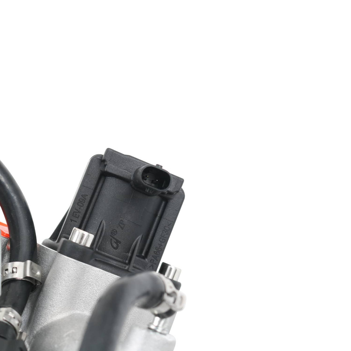 Turbocharger electrical connector on cast housing with black wire and metal clamp