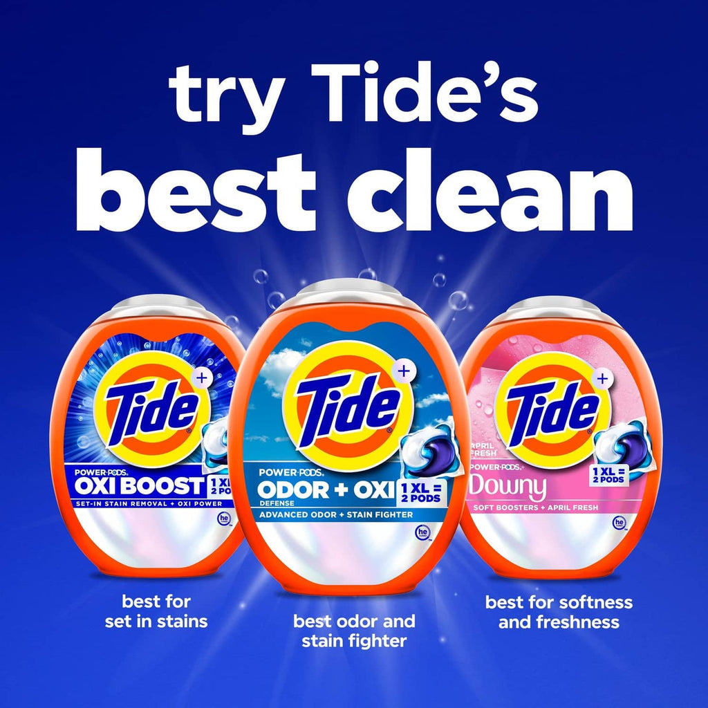 Three Tide laundry detergent pac canisters on blue background
