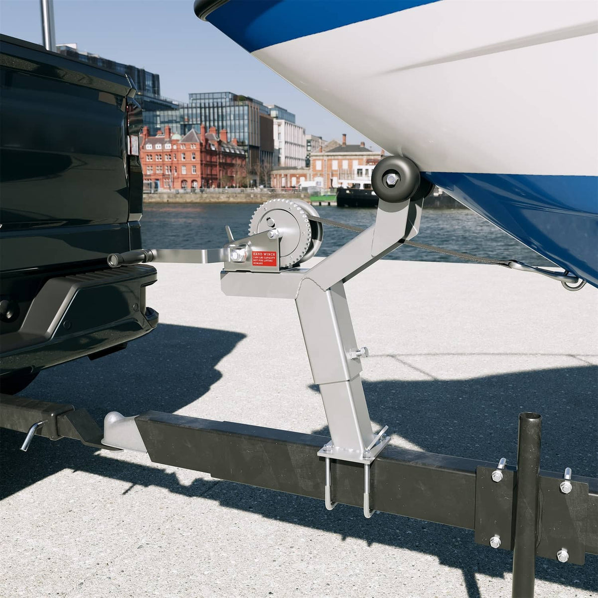 Adjustable winch post attached to trailer beam, with roller assembly near the boat bow.