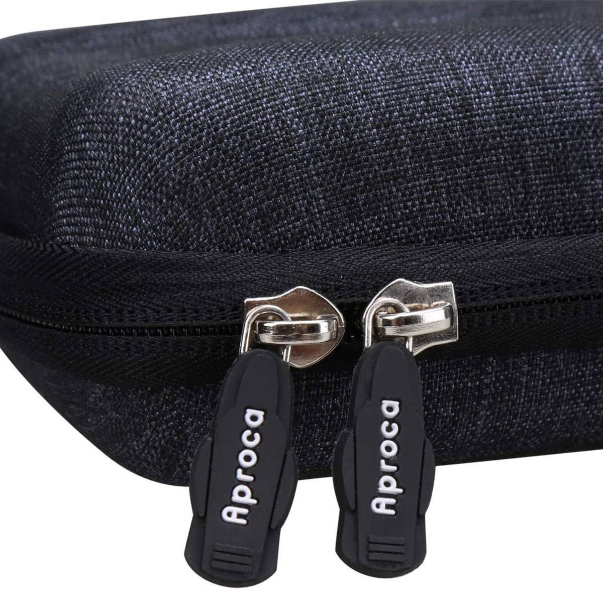 Dual metal zipper pulls on dark fabric hard travel case with Apocra tags