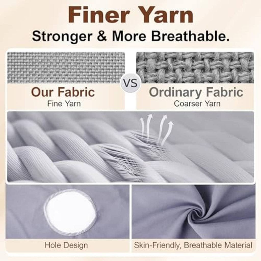 Gray massage sheet fabric with circular face-hole cutout and woven texture close-up