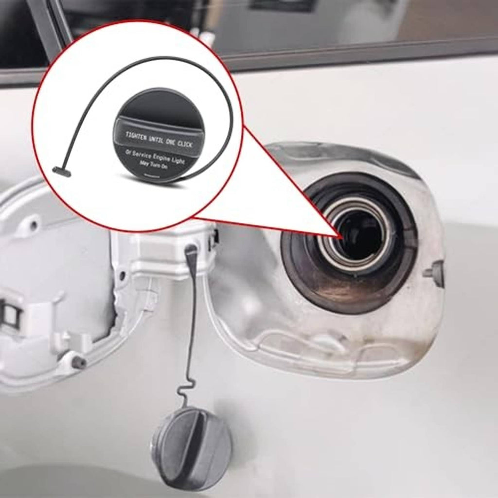 Fuel tank filler area with black gas cap cap installed and tether visible