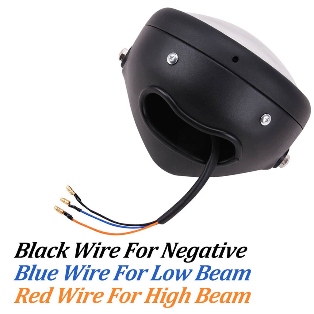 Black motorcycle headlight with wire leads and side mounting bolts