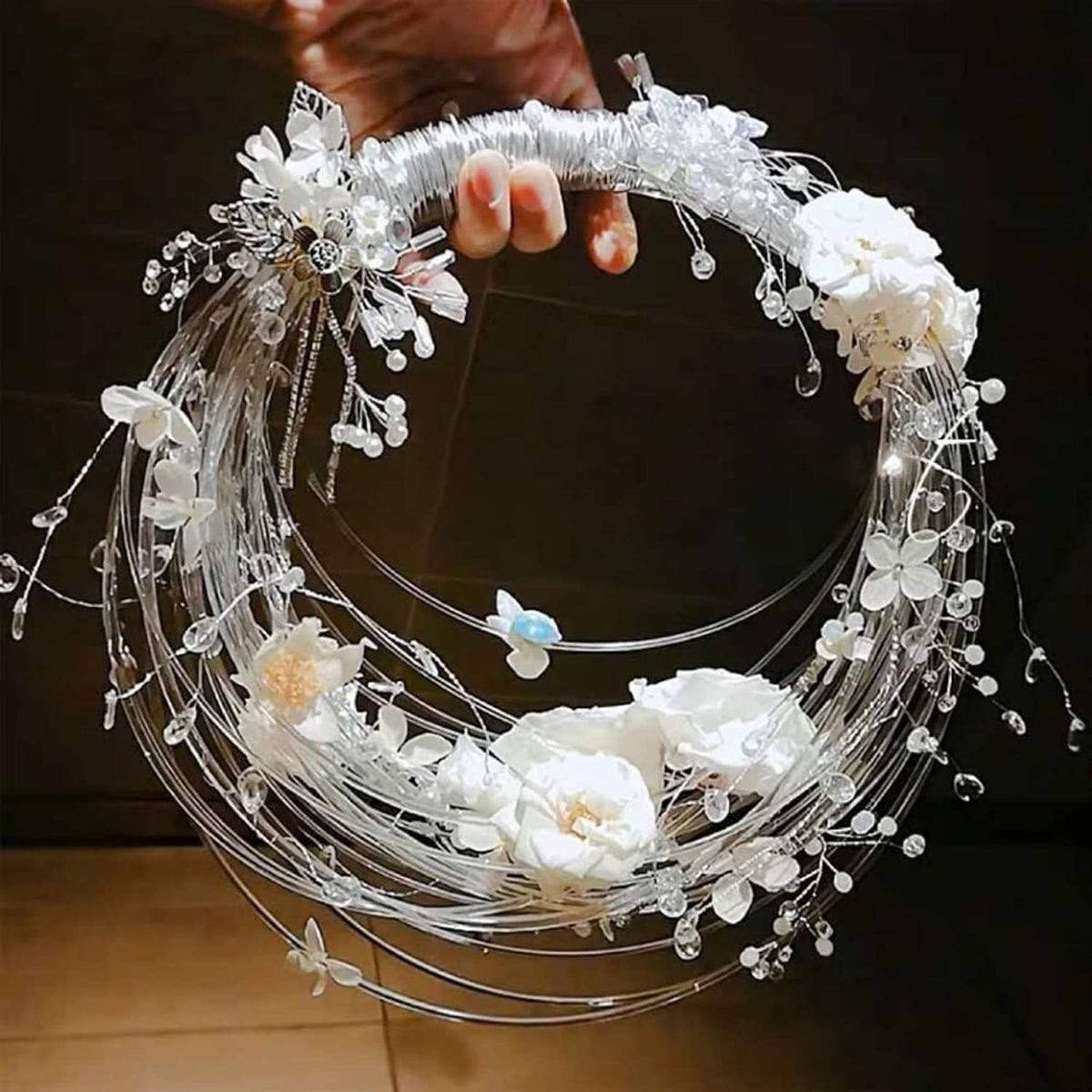 Silver aluminum craft wire wreath frame with hanging bead and charm details
