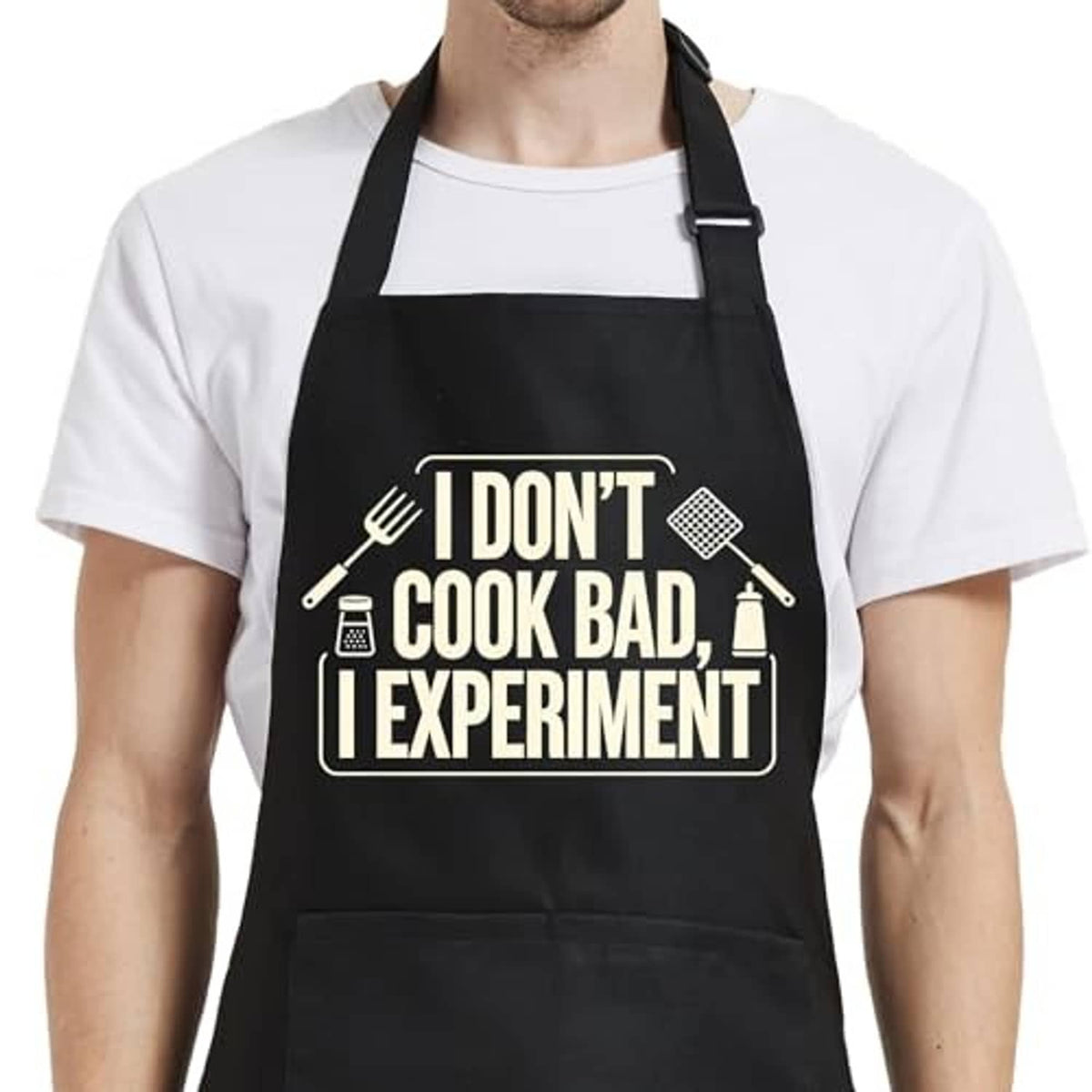 Black cooking apron with bold front message graphic and adjustable neck strap