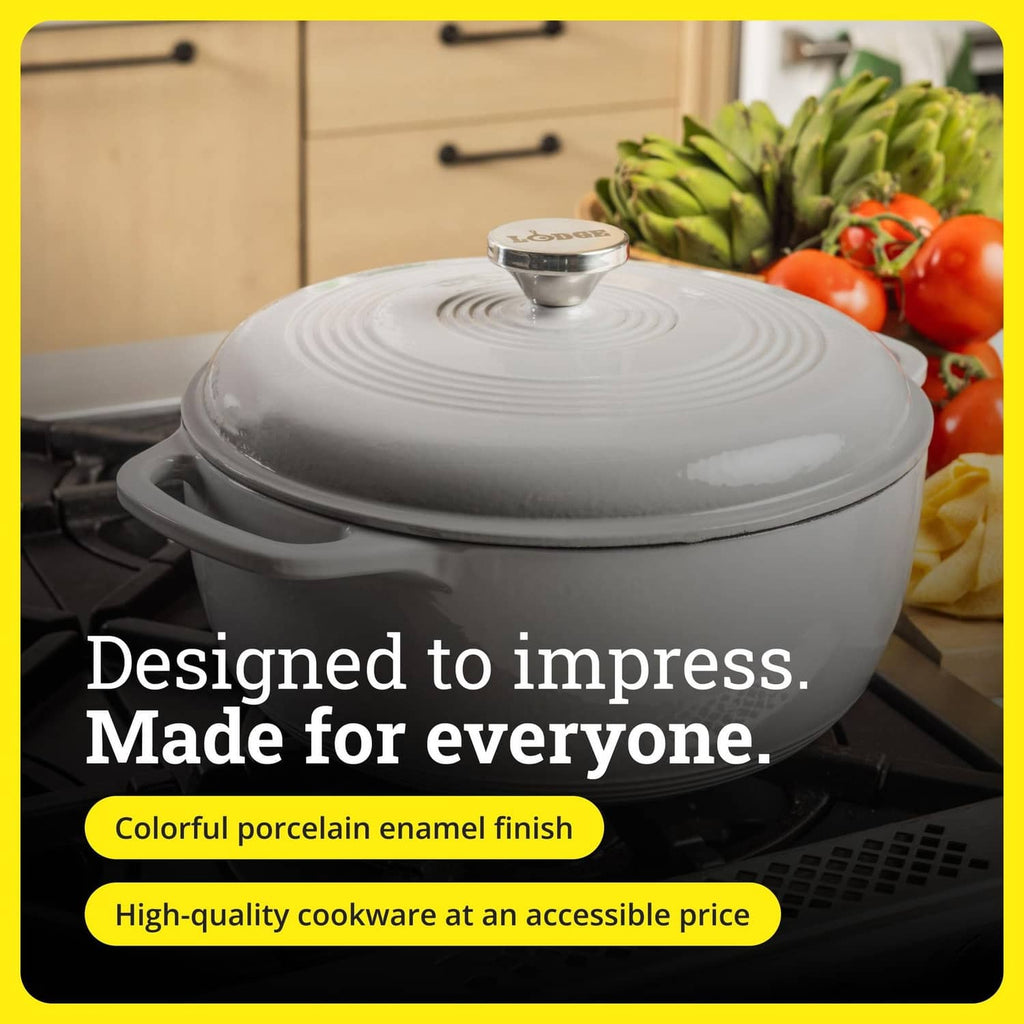 Oyster white enamel cast iron Dutch oven with domed lid on stovetop