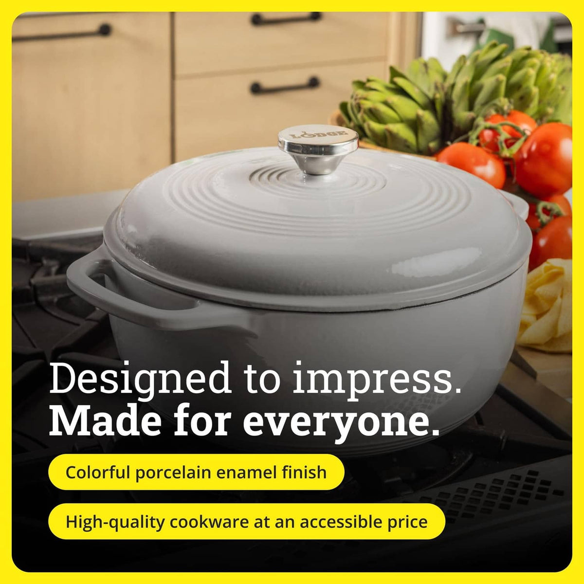 Oyster white enamel cast iron Dutch oven with domed lid on stovetop