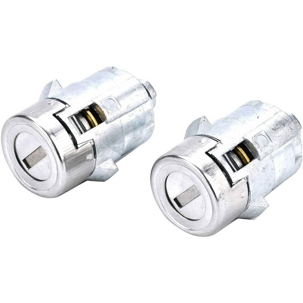 Two silver door lock cylinder cores with keyway openings and brass pins