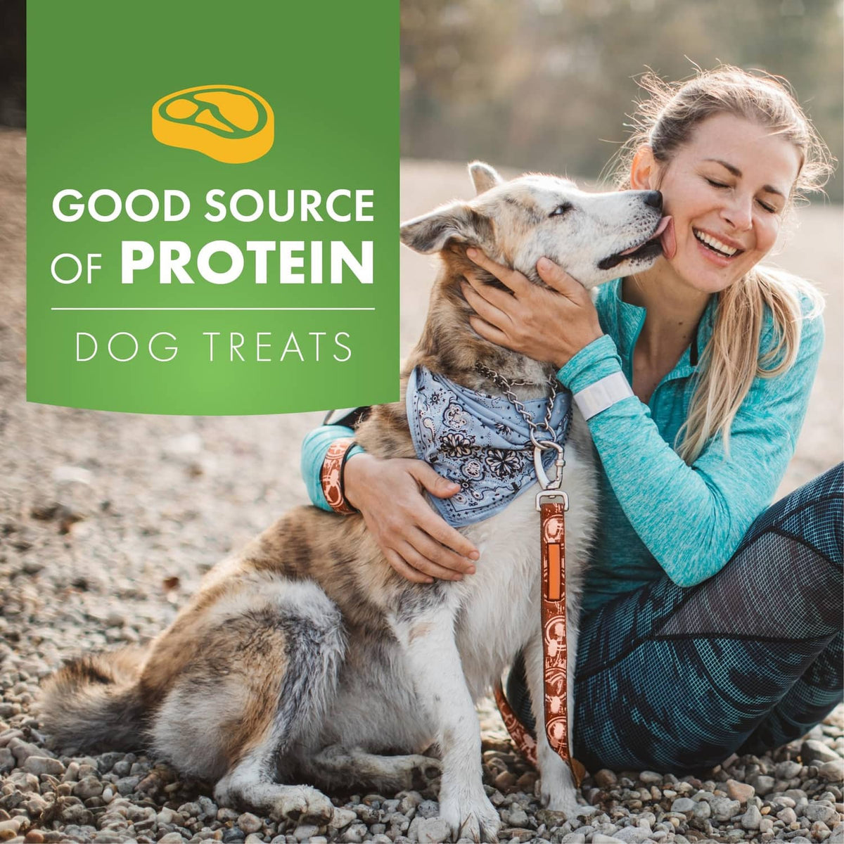 Pur Luv dog treats protein promotion with woman holding a spotted dog