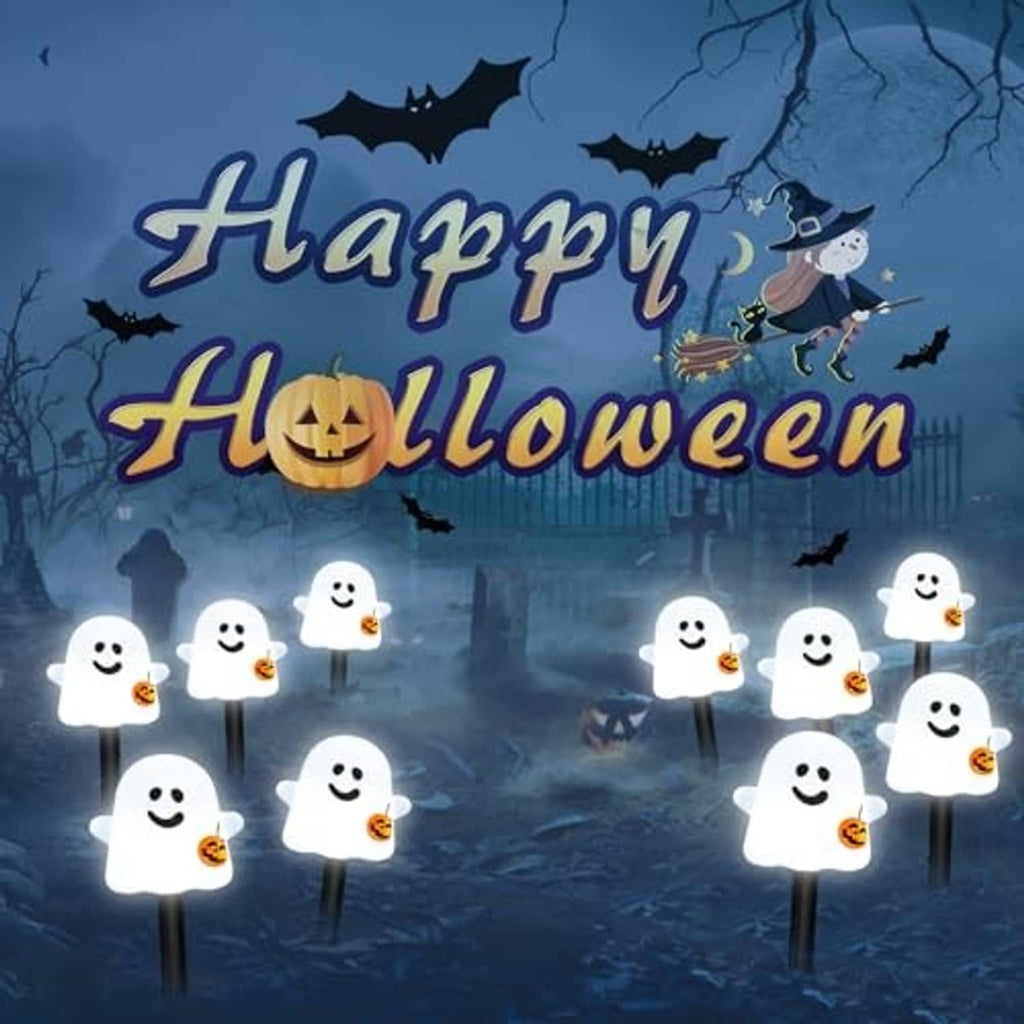 White glowing ghost pathway lights with jack-o'-lantern buckets on outdoor stakes