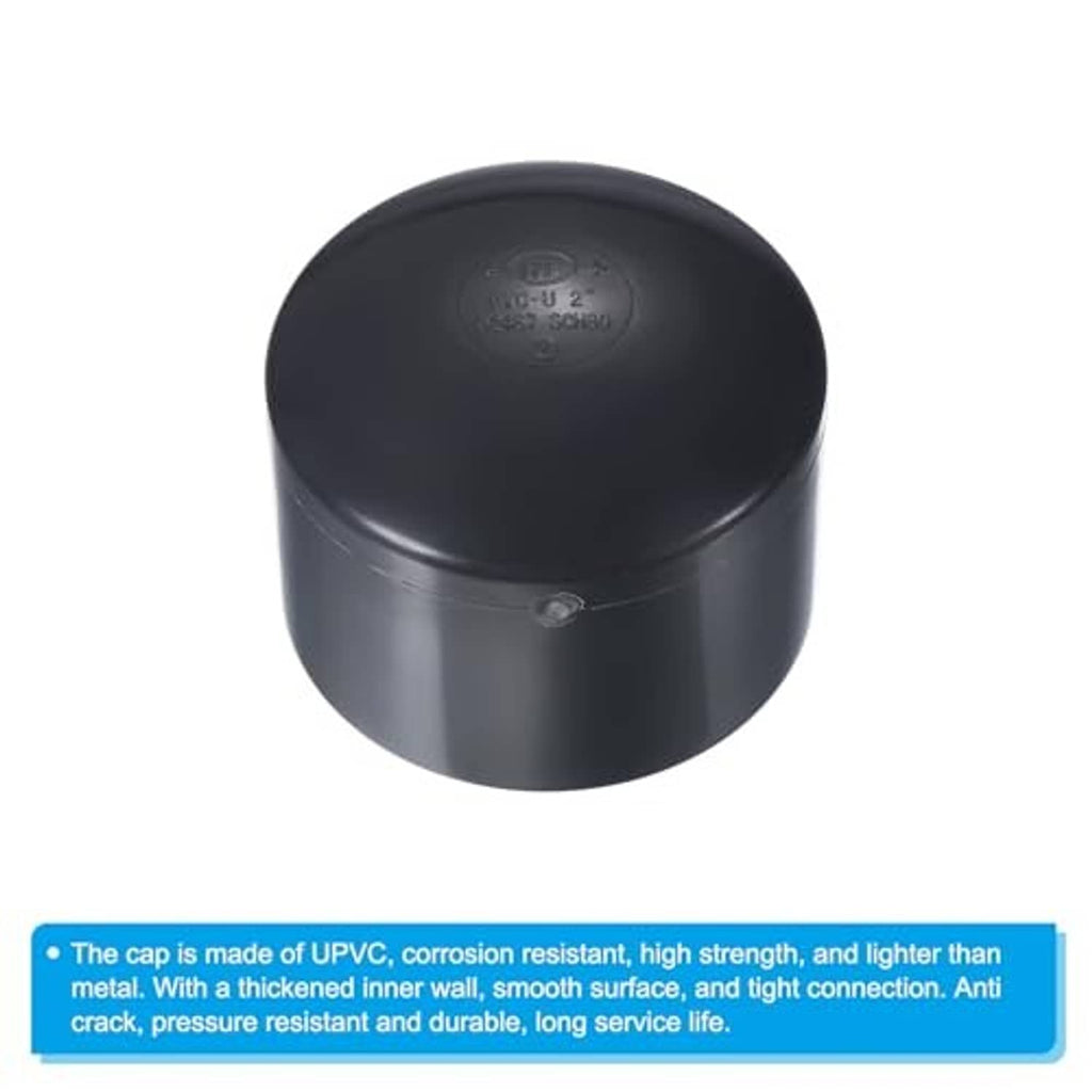 Black round UPVC pipe end cap plug fitting with embossed text on top and center nub