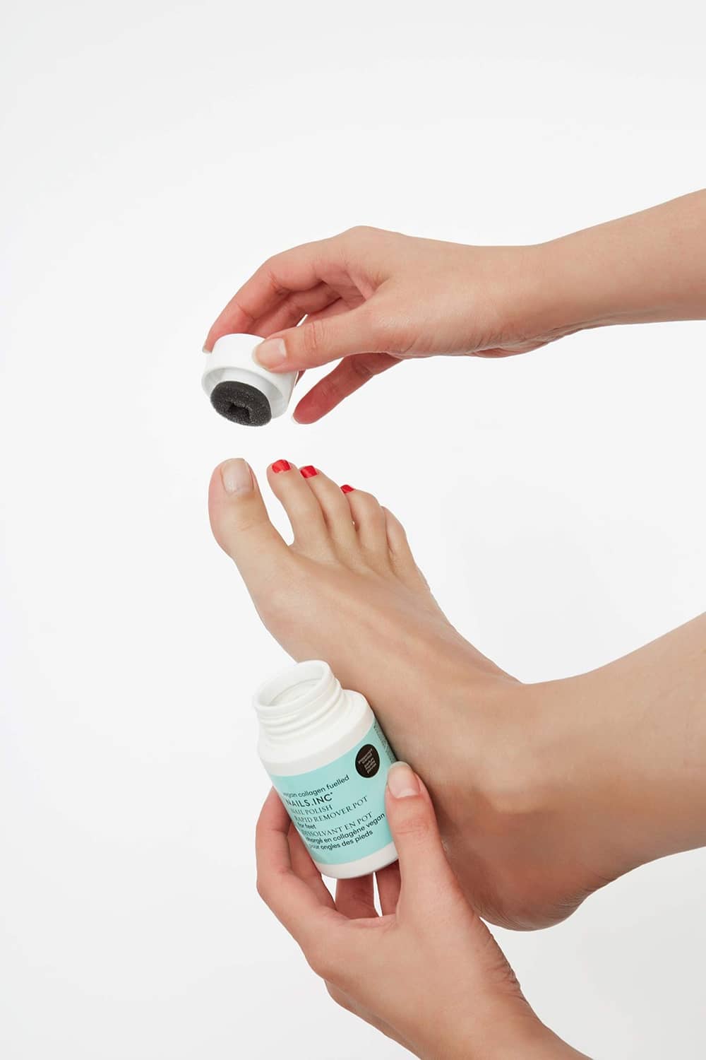 Nail polish remover pot and sponge pad, hands using on fingertips
