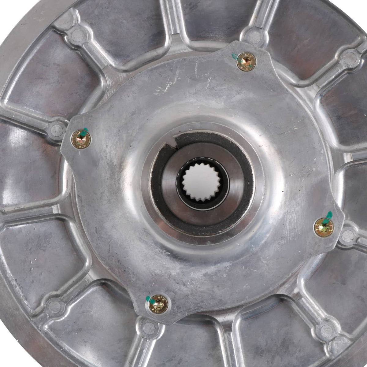 Close-up of silver clutch center splined hub and mounting screws