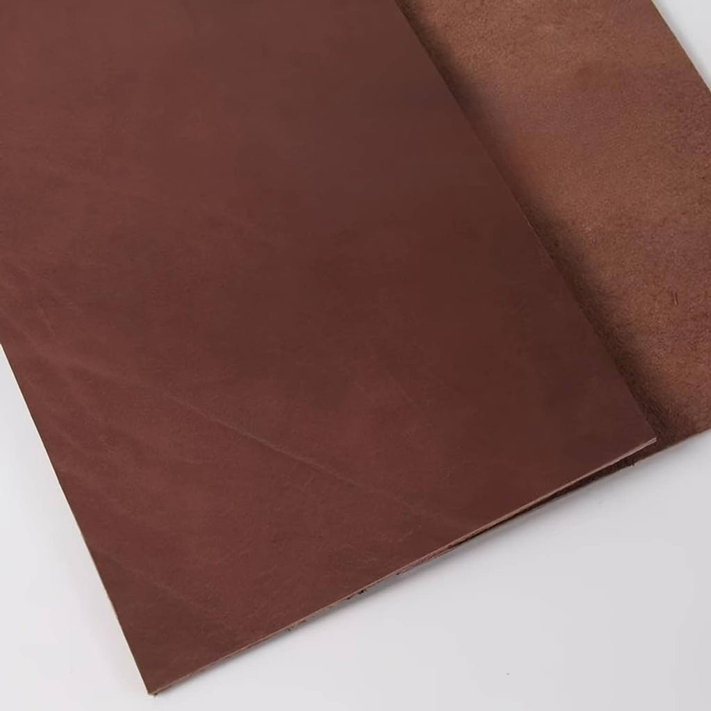 Brown leather sheet laid flat with smooth grain and raw edge visible