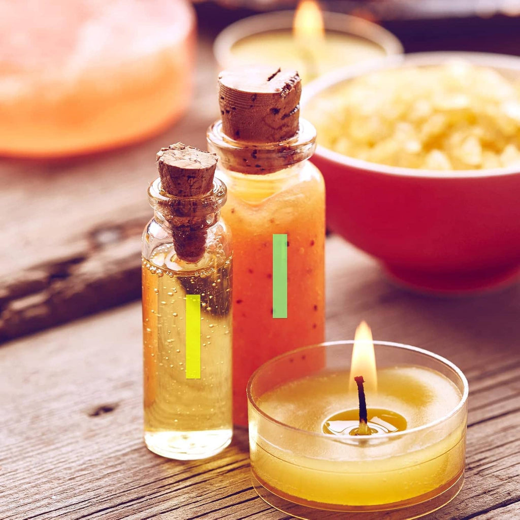 Colorful transparent tape strips in yellow and green placed on candles for highlighting