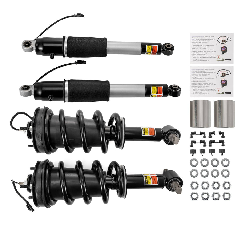 Front and rear shock strut assemblies with black spring coils and silver cylinders, plus parts kit