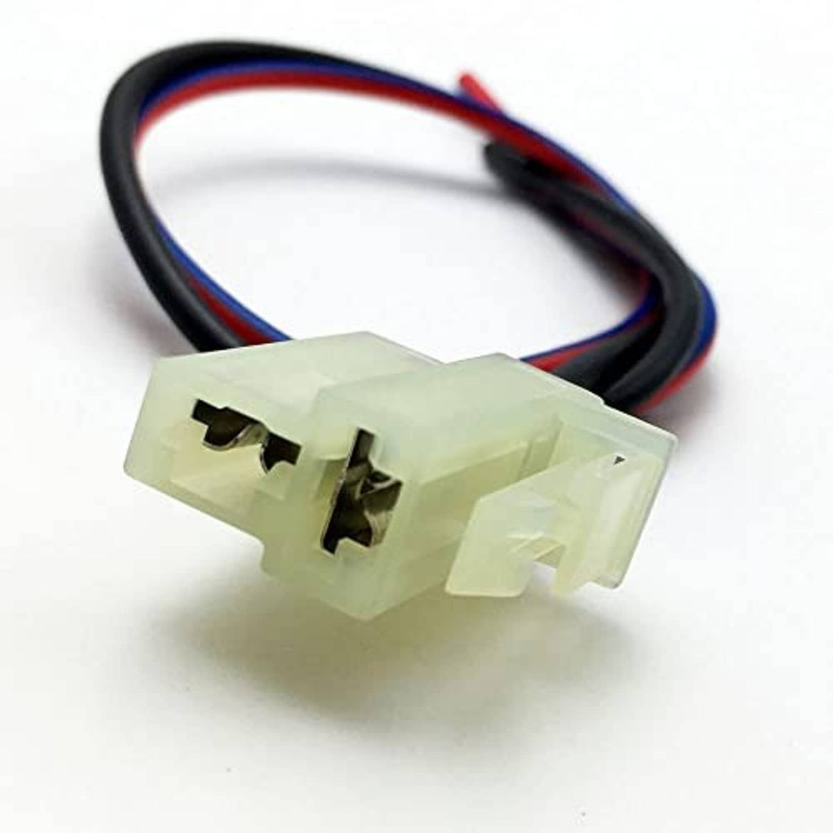 Alternator pigtail harness showing white connector with terminals and red/blue/black wire bundle