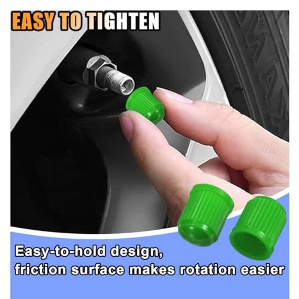 Hand tightening a green tire valve stem cap onto the valve stem