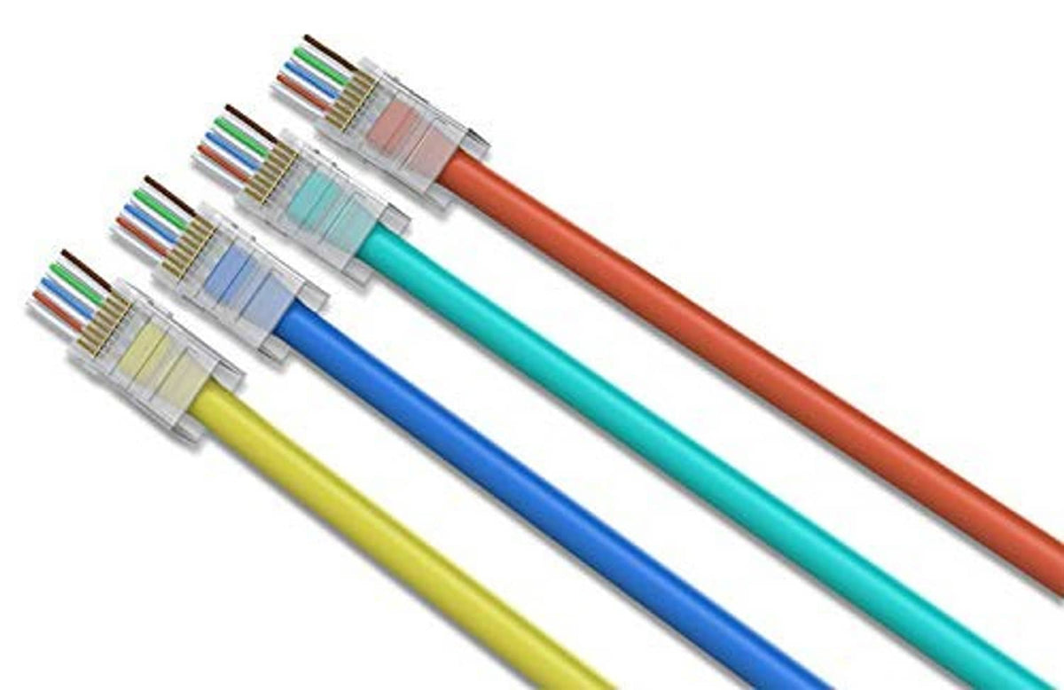 RJ45 pass-through connectors attached to multi-color Ethernet cables