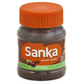 Sanka instant coffee jar with orange lid, brown granules, naturally decaffeinated label