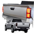 Taillight cover on pickup rear right lamp with amber glow, custom-fit shield