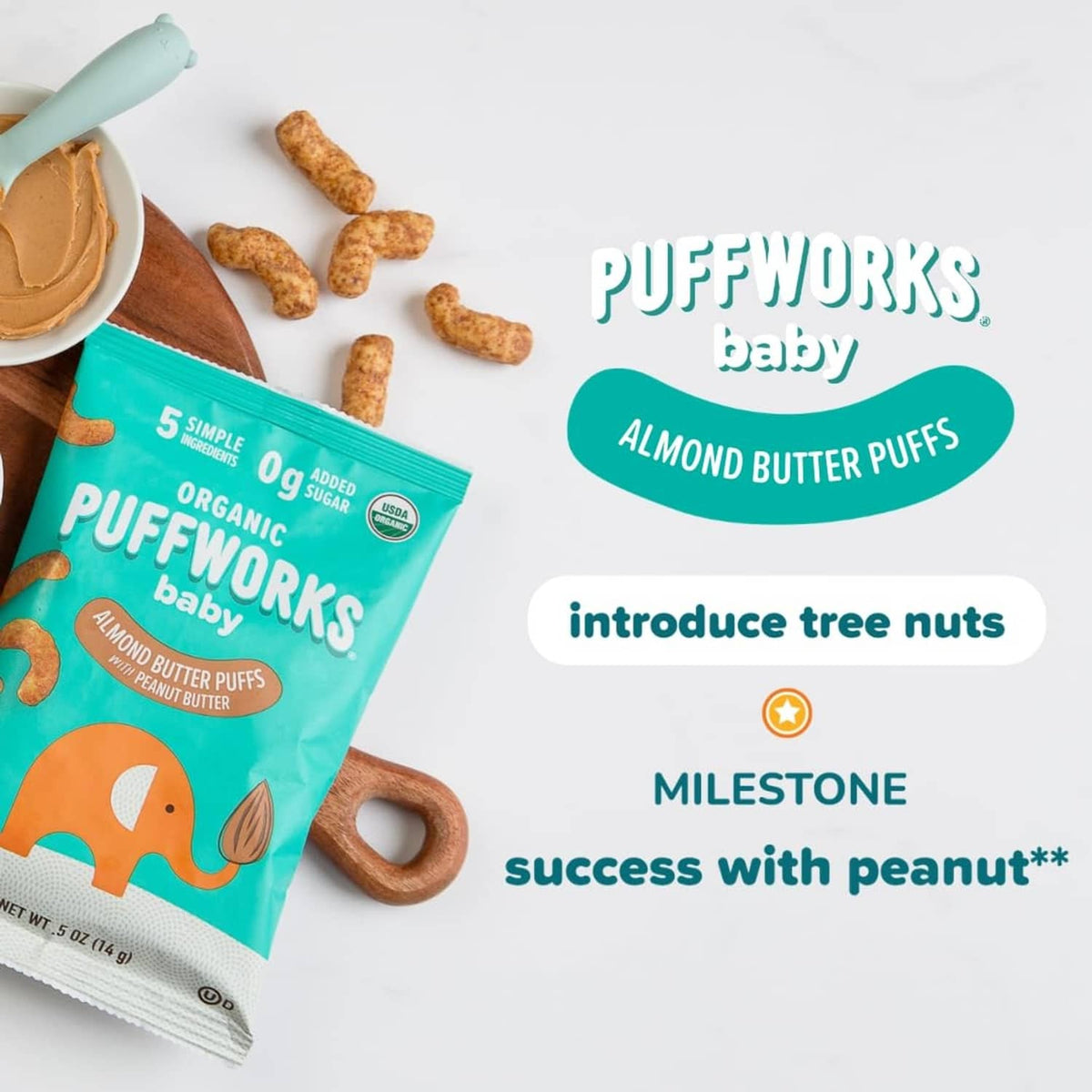 Organic baby almond butter puffs pouch with visible snack pieces and elephant logo
