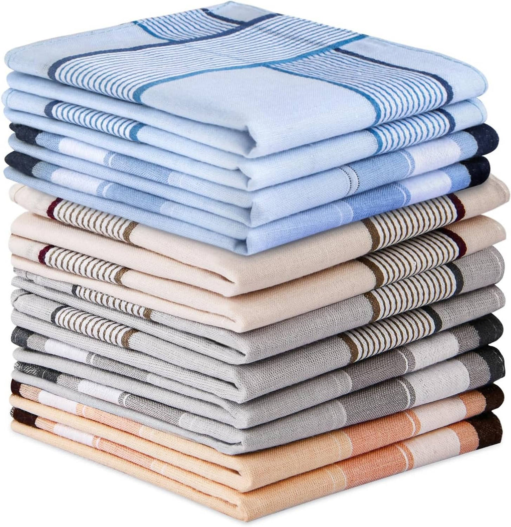 Stack of men’s handkerchiefs in light blue with navy stripe patterns and folds