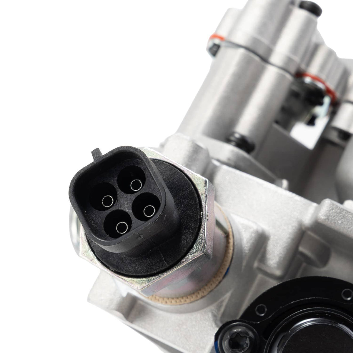 Throttle body assembly close-up of black electrical connector and metal mounting
