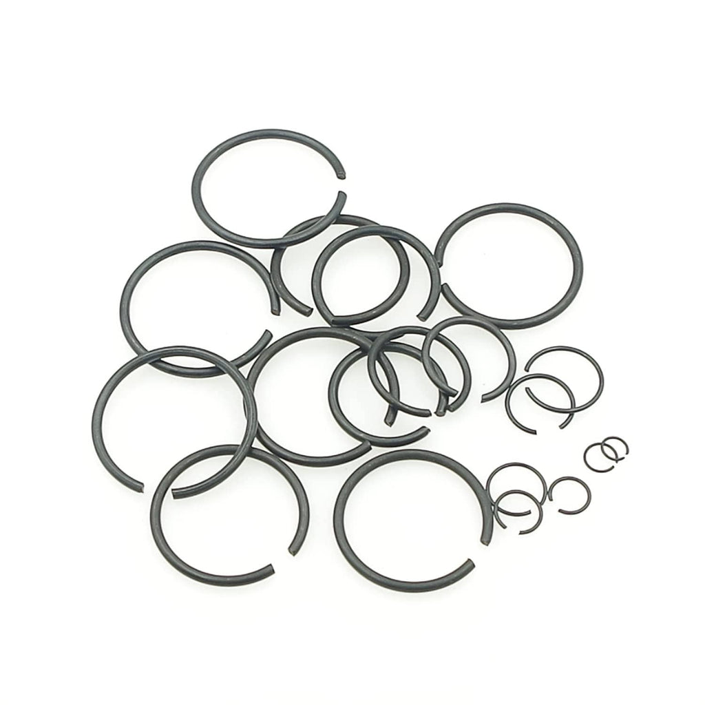 Assorted round wire external retaining rings with C-clip ends, dark gray