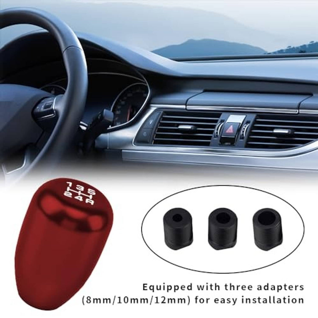 Red manual gear shift knob with three black adapter sleeves for installation