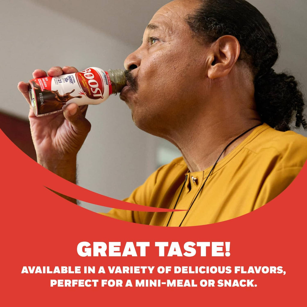 Nutritional drink bottle being sipped by a person in a yellow top