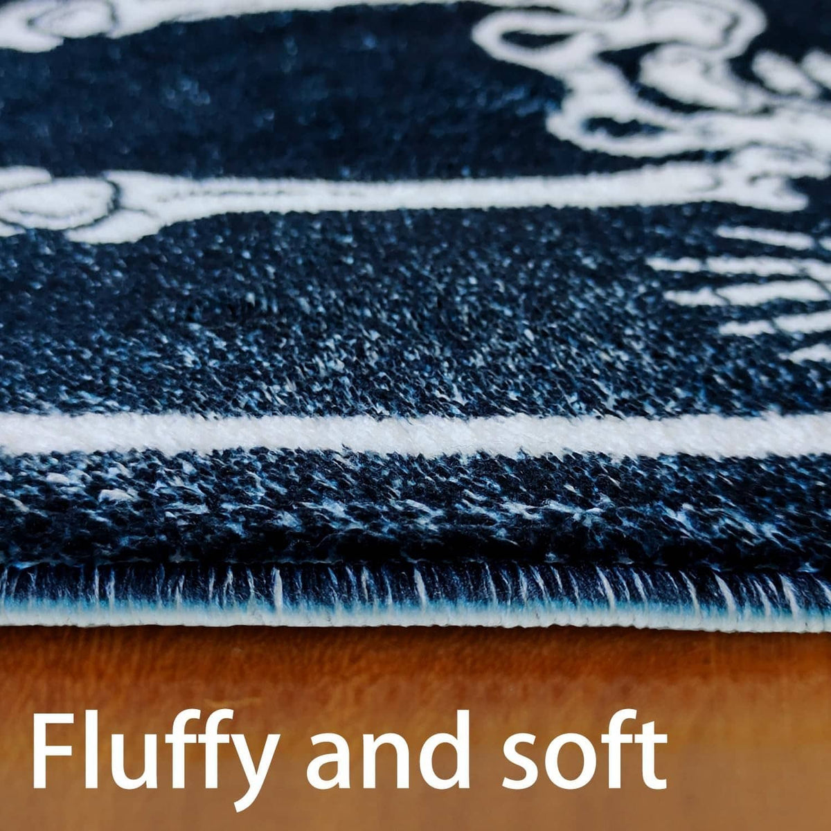 Close-up of dark bath mat texture with white border, soft plush pile