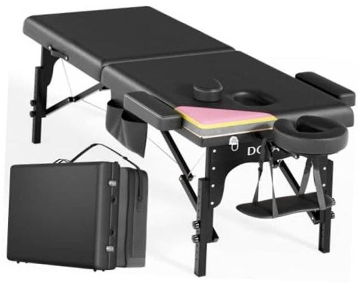 Portable 2-fold massage table with black padded top, face cradle, armrests, and carry case