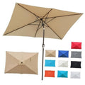 Tan rectangular patio umbrella with black rib frame and center tilt pole