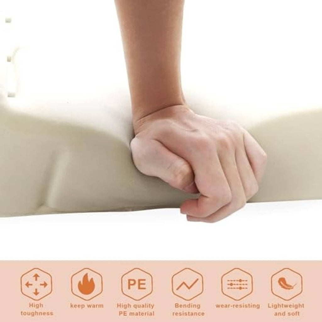 Cream seat foam cushion pad pressed by hand, showing soft, gripped surface
