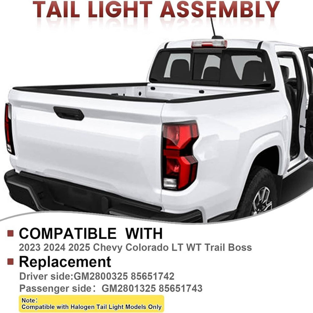 Tail light assembly mounted on rear of white pickup truck, right passenger
