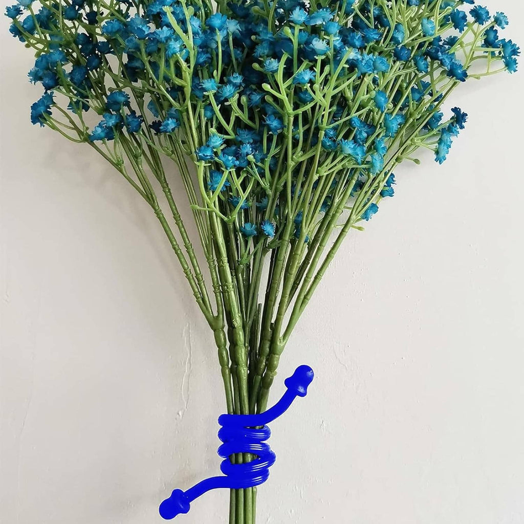 Blue silicone twist tie securing a bouquet of blue flowers