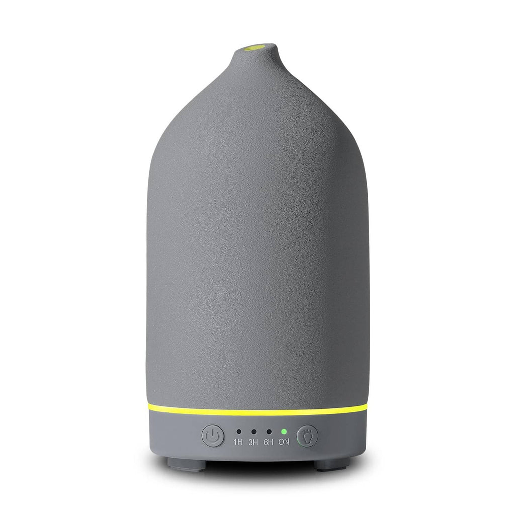 Grey ceramic essential oil diffuser with base control buttons and mist outlet ring