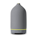 Grey ceramic essential oil diffuser with base control buttons and mist outlet ring