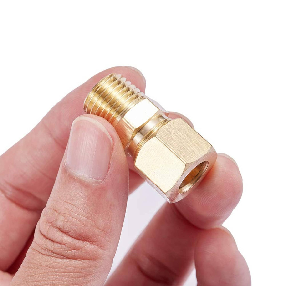 Brass compression tube fitting close-up with hex nut, ridged threads, and male NPT end