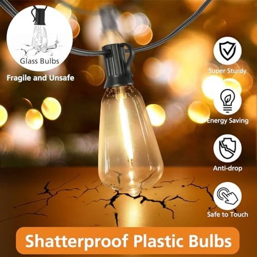 Clear bulb LED string light with black socket and warm filament glow