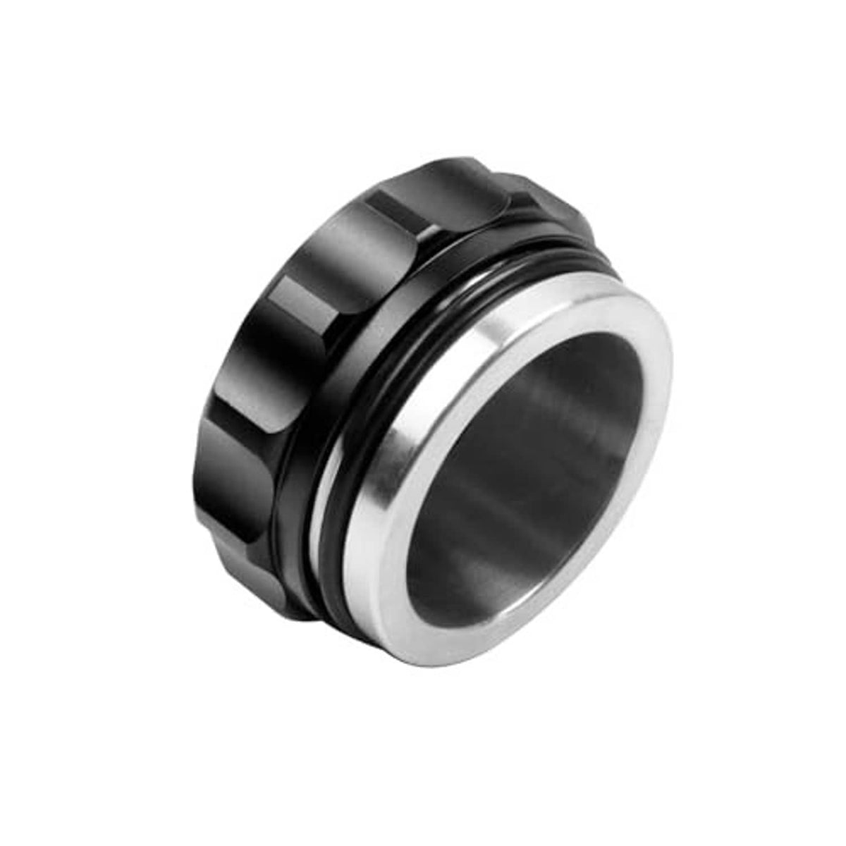 Side view of black filler neck cap with silver inner opening and ridged outer ring