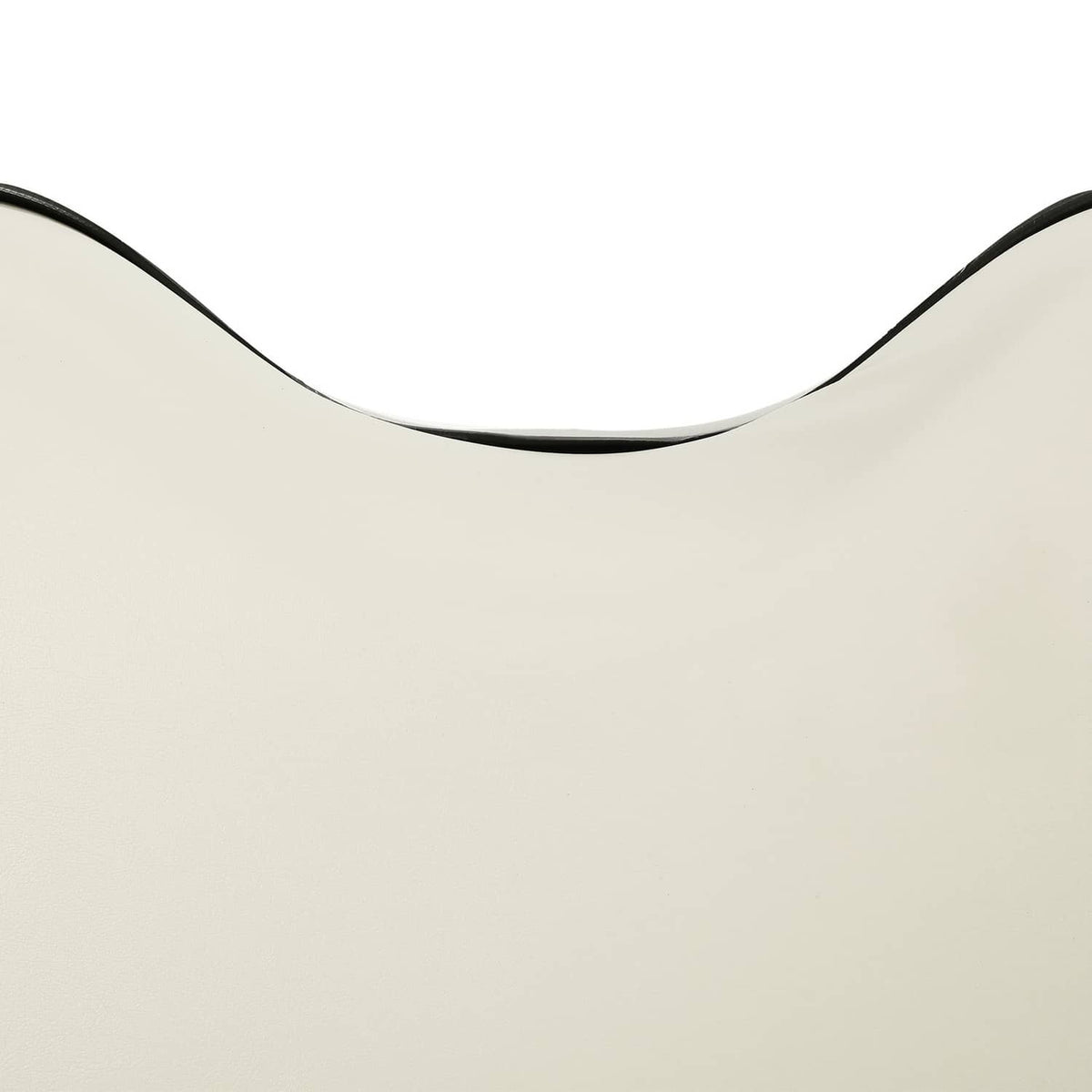 Off-white seat cushion with black trim and curved edge