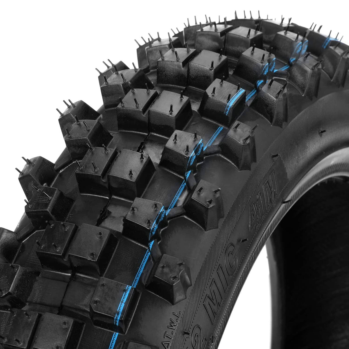 Knobby black tire tread with deep block pattern for dirt bikes