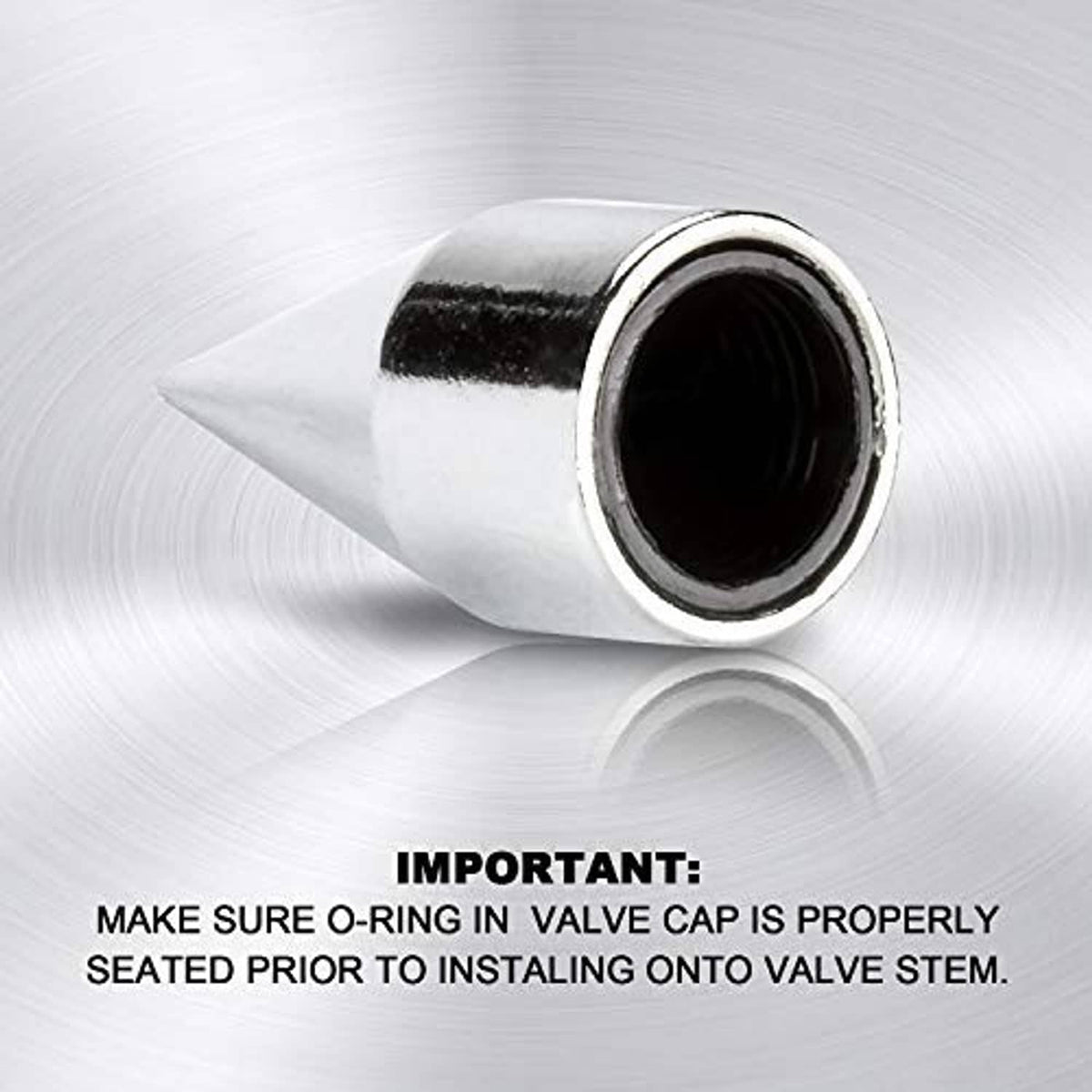 Chrome spiked valve cap close-up showing outer rim and threaded opening