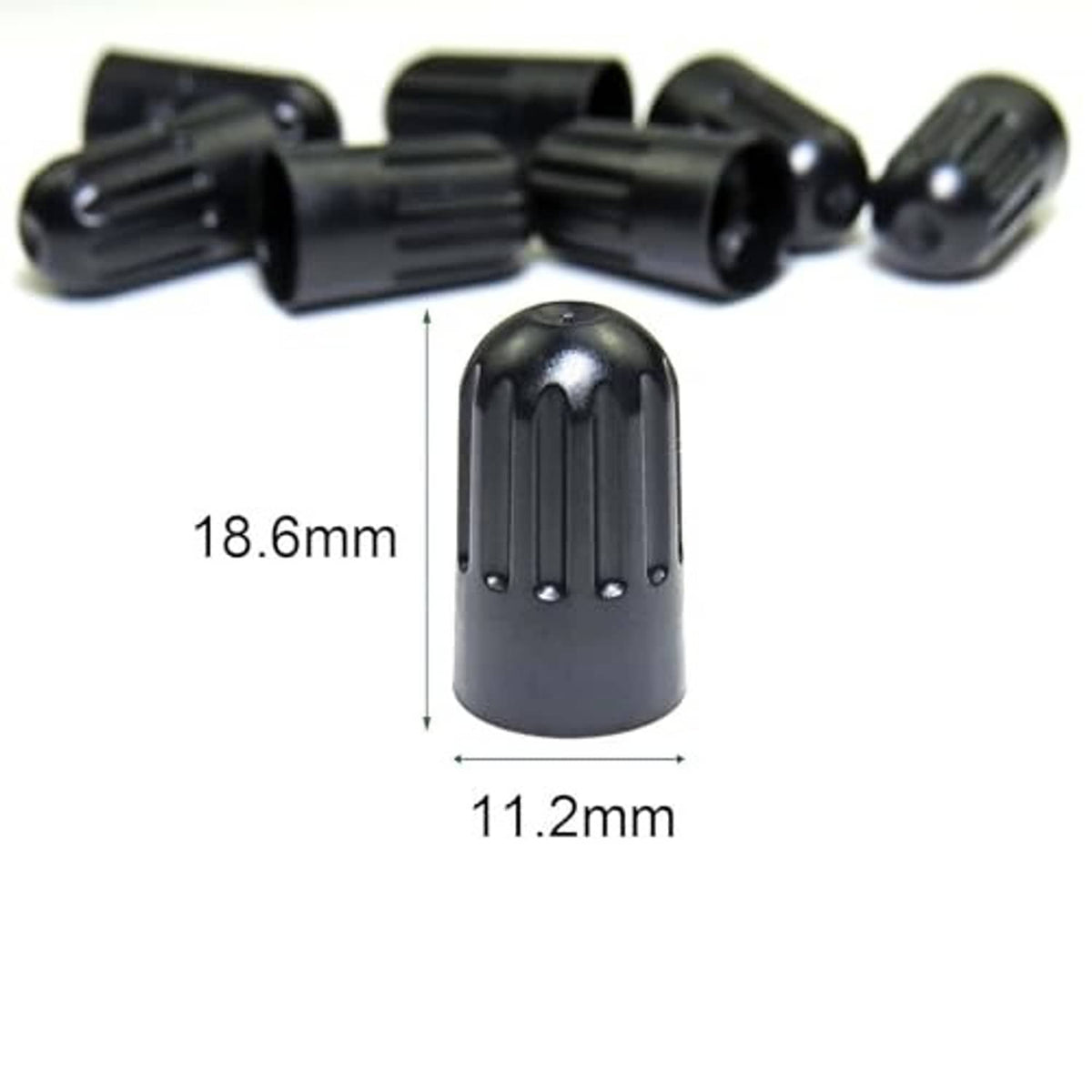 Black plastic long tire valve stem caps, compact ribbed design with measurement layout