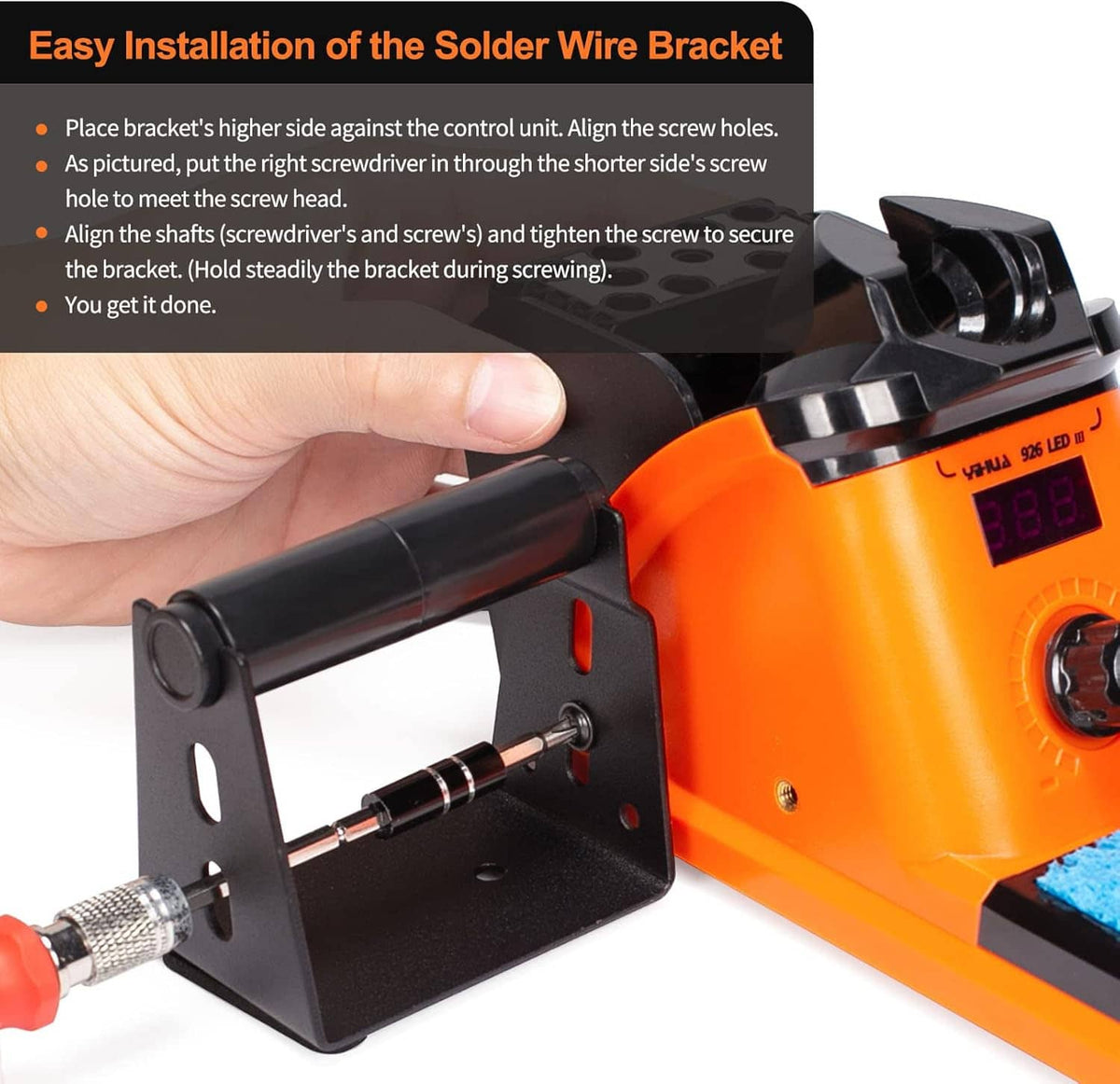 Orange soldering station with helping hands bracket being secured by a screwdriver