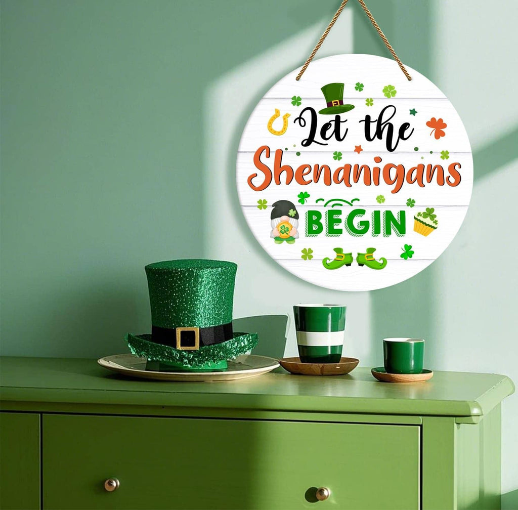 Round hanging door sign on rope with “Let the Shenanigans Begin” message