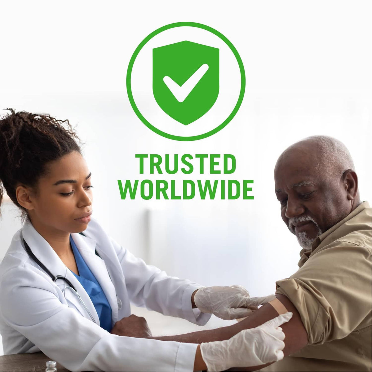 Clinician applies beige foam border dressing to patient arm