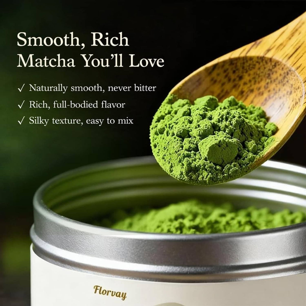 Green matcha powder in a wooden scoop next to a silver matcha tin